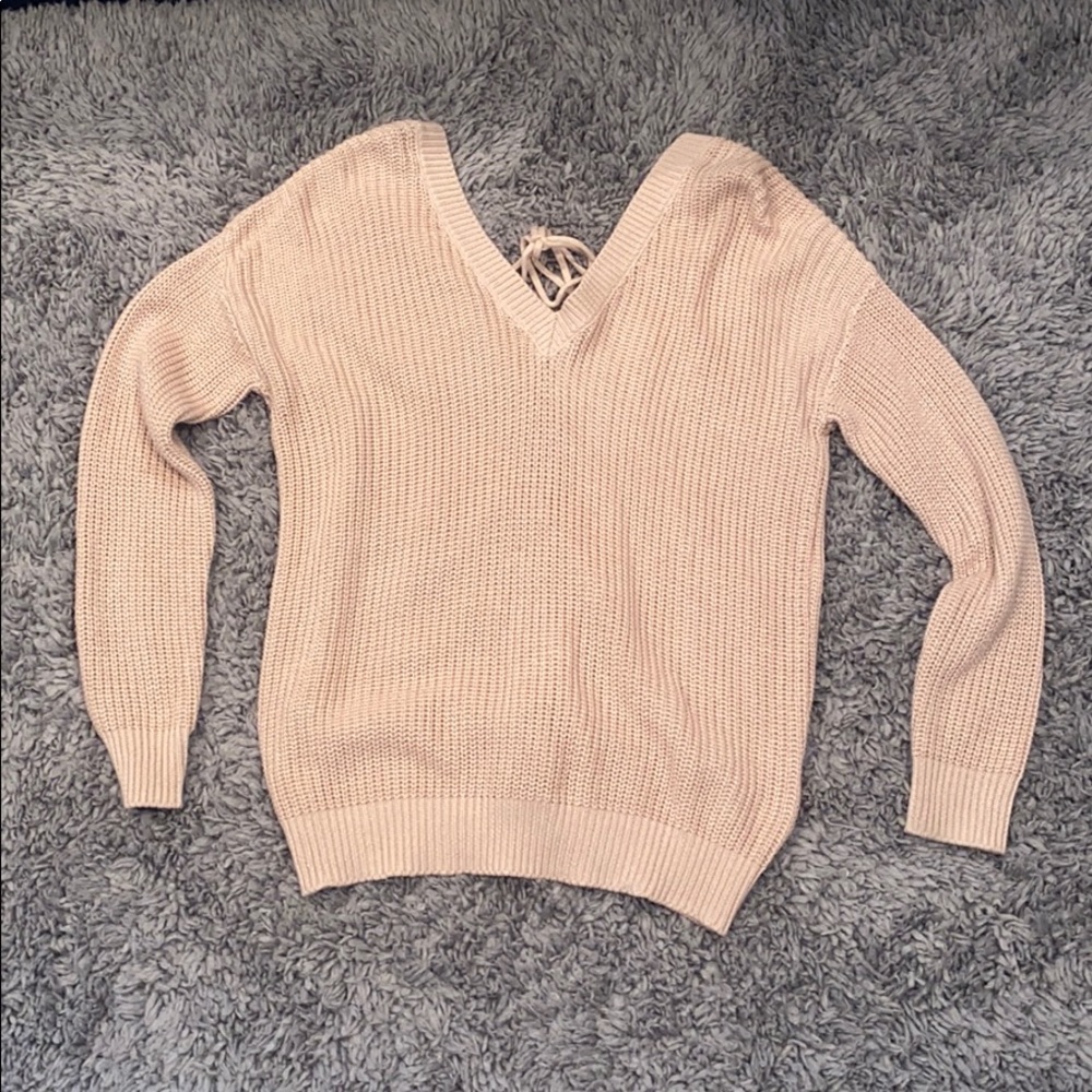 Laced up back cream sweater